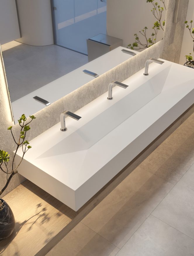 E-Series Xonyx™ solid surface tabletop with integrated basin designed for commercial and project bathrooms
