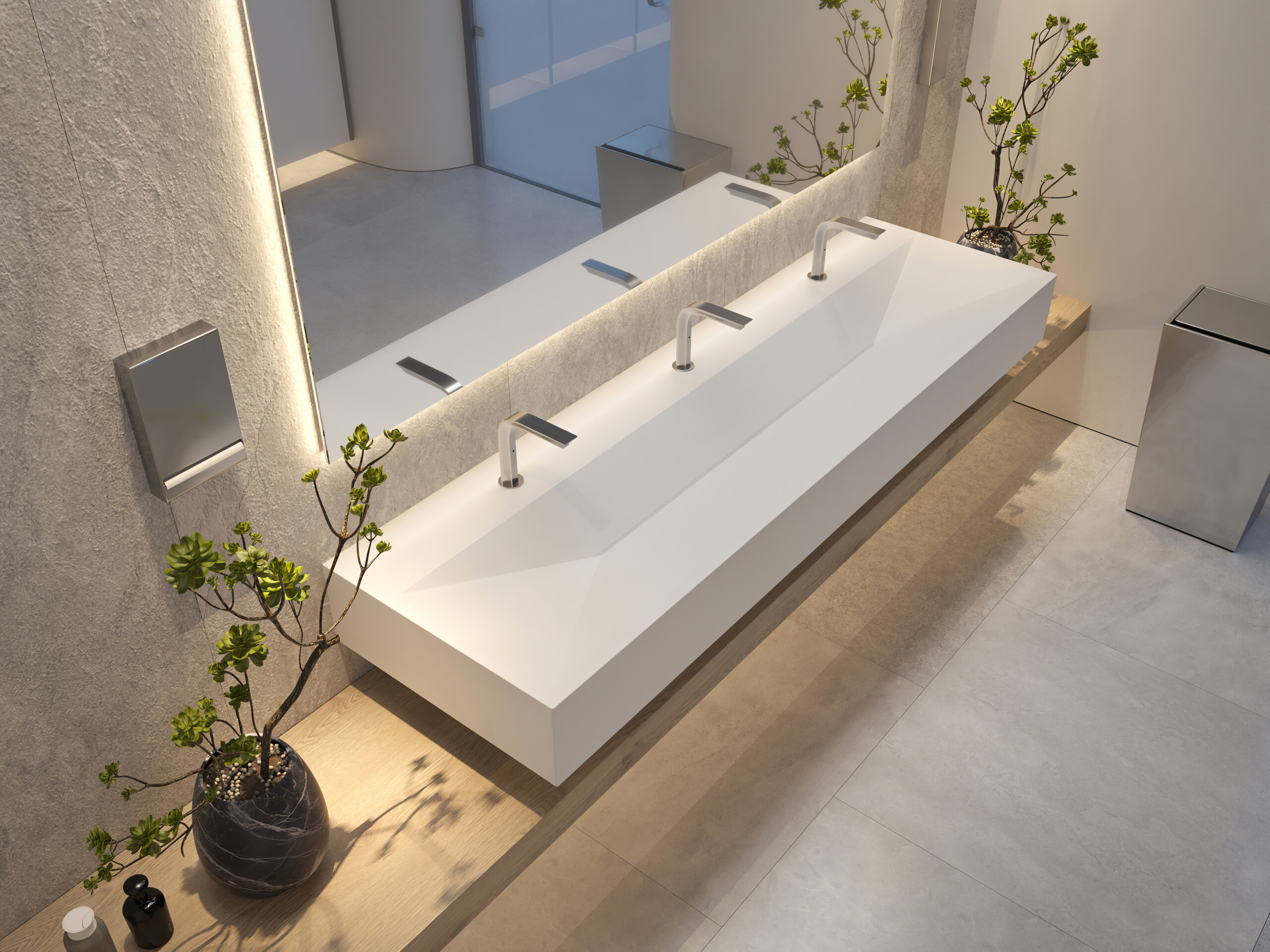 E-Series Xonyx™ solid surface tabletop with integrated basin designed for commercial and project bathrooms