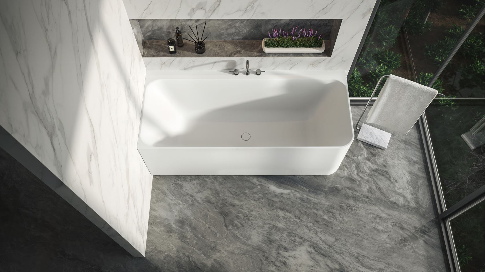Top view of the Cleo corner-connected bathtub in a bathroom
